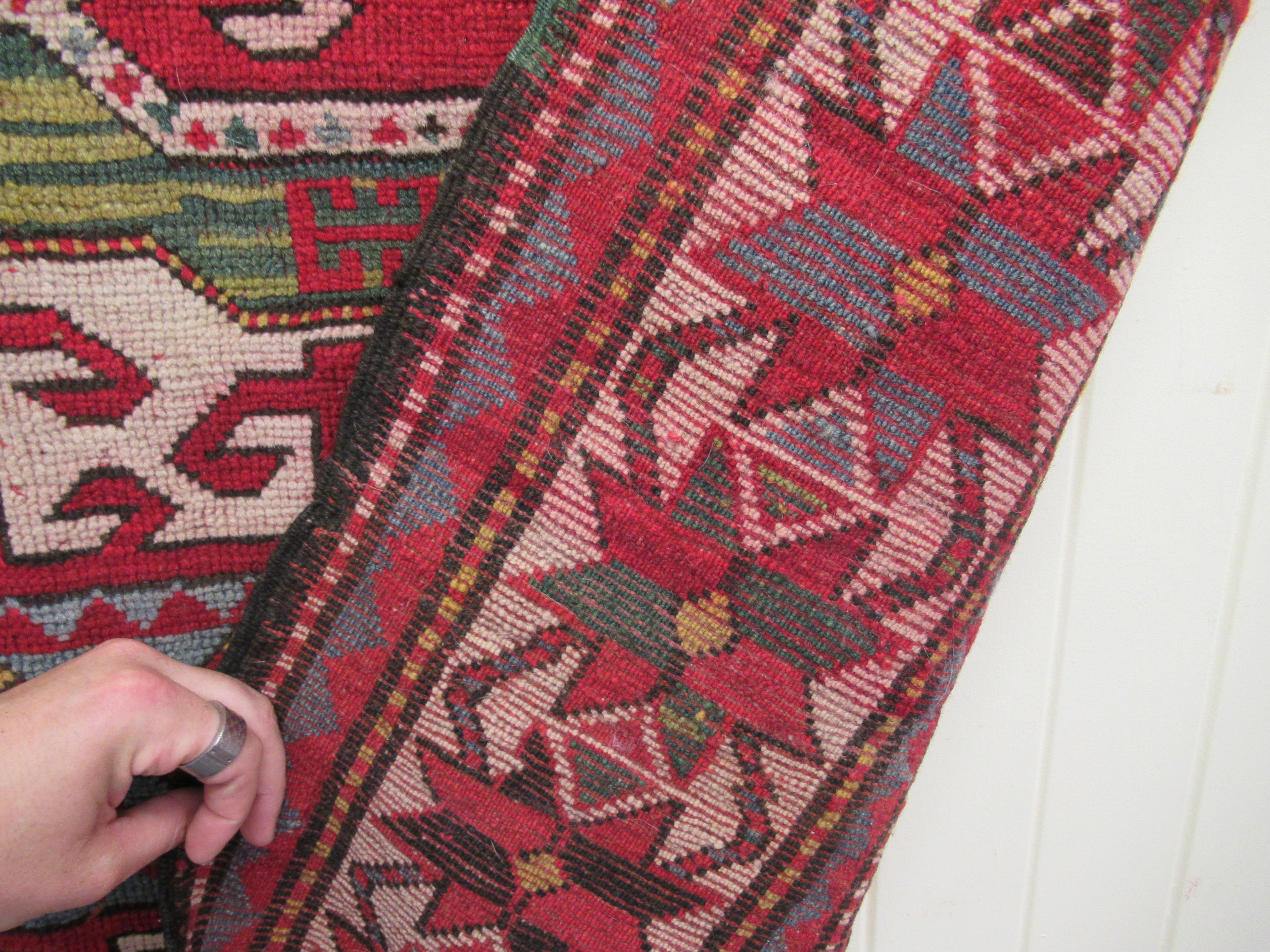 An Afghan Kazak rug, decorated with repeating geometric designs, on a cream ground  52" x 94" - Image 4 of 4