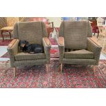 A pair of 1960s/1970s three tone, textured fabric upholstered, low, enclosed armchairs with panelled