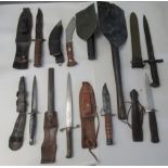 Military style and other daggers; and two trenching tools  (Please Note: this lot is offered subject