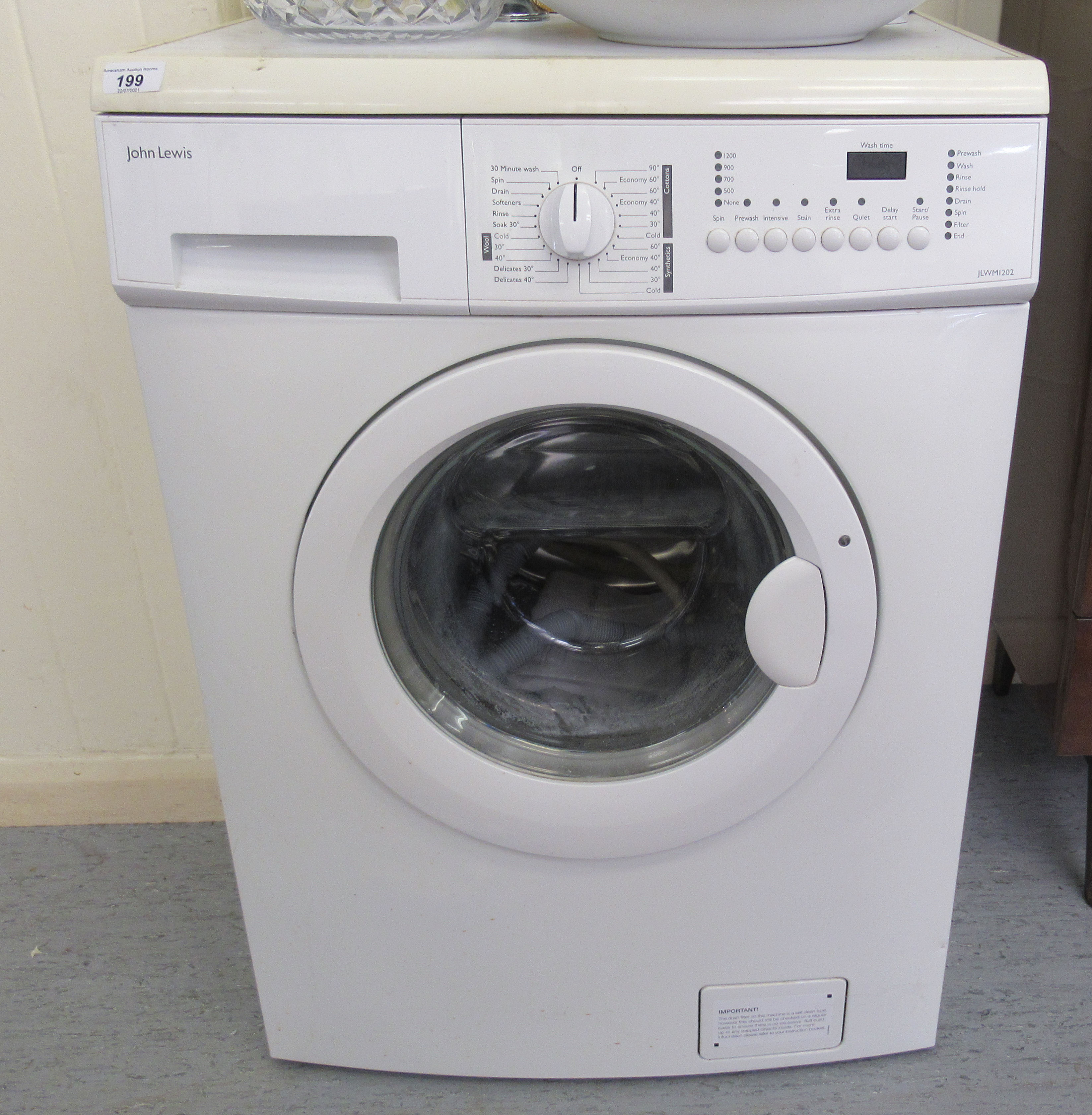 A John Lewis JLWM1202 washing machine  33.5"h  23.5"w