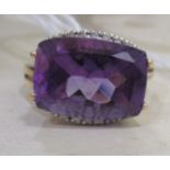 A 9ct gold amethyst and diamond ring