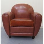 A modern enclosed armchair, upholstered in stitched faux brown hide, raised on block feet