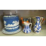 Ceramics: to include an Art Deco Flaxman ware jug, the handle fashioned as a parrot  8"h
