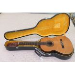 A Japanese made Cimar accoustic guitar, model no.362  bears a label  cased