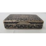 An early/mid 20thC Russian silver snuff box, profusely decorated with nielloworked foliage  bears '