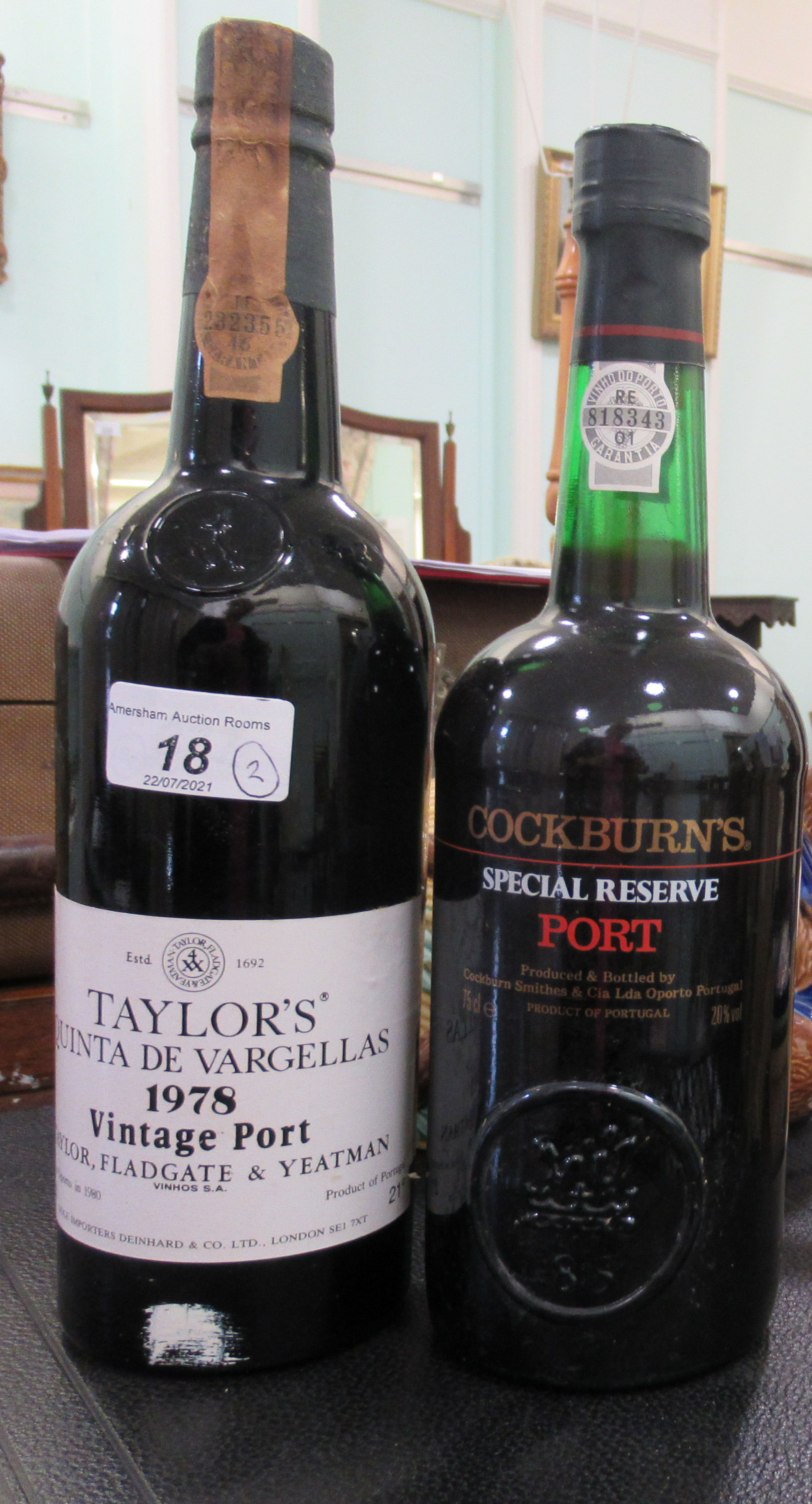 A bottle of Taylor's 1978 vintage port; and another bottle of Cockburn's port