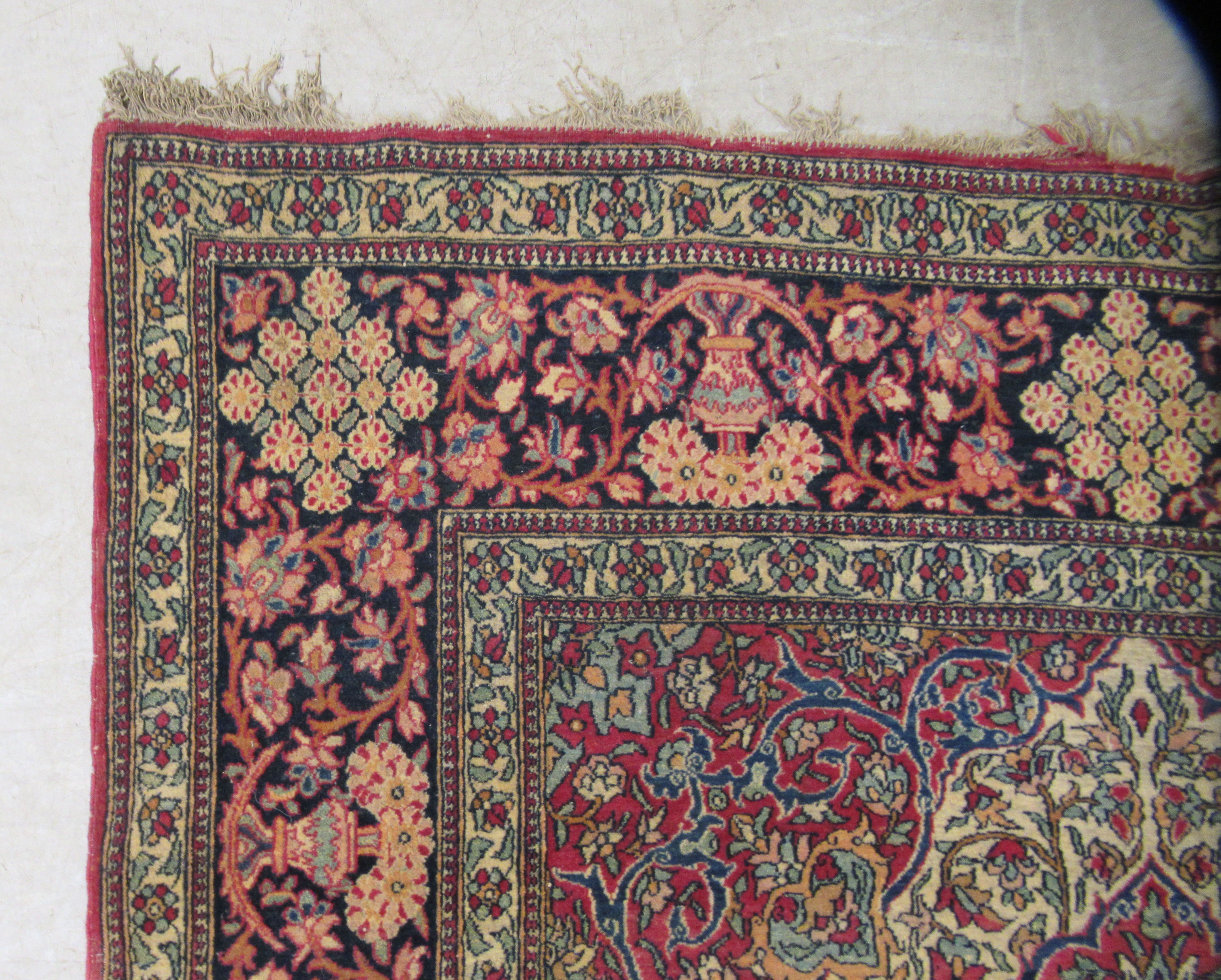 A Persian rug, decorated with a serpentine outlined medallion, bordered by stylised designs on a - Image 3 of 4