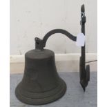 A 20thC cast metal ship's bell  8"h, on an anchor bracket  9"h