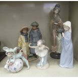 Lladro and Nao porcelain figures: to include a child, dressed in a mouse costume  6"h