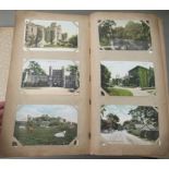 An uncollated postcard album, containing coloured and monochrome issues, church interiors and scenic