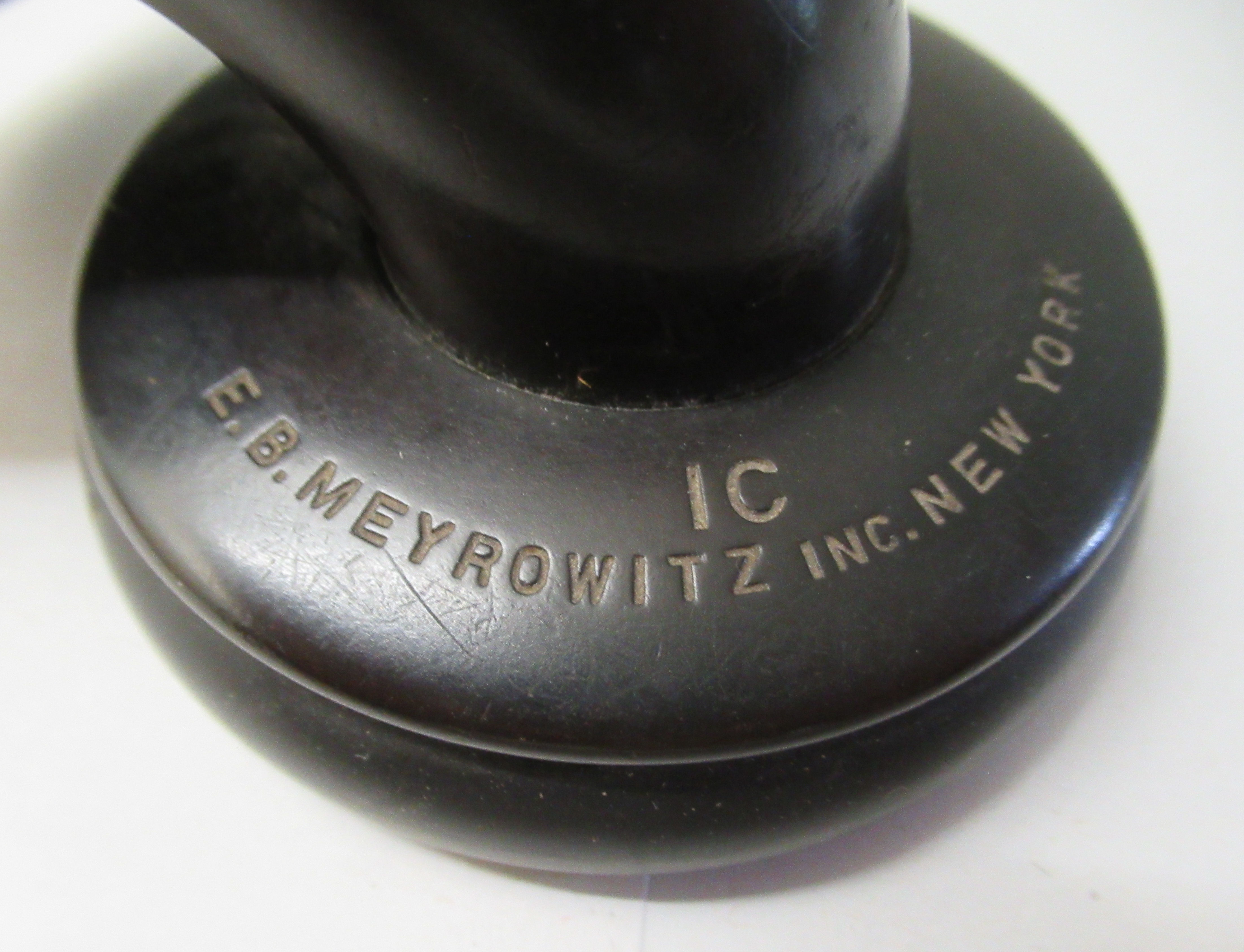A late 19th/early 20thC EB Meyrowitzinc US made Otophone with a moulded card dust cover  approx. 3. - Image 5 of 6
