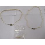 Two vintage style graduated pearl necklaces, one clasp set with two small diamonds, the other with
