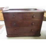 A late Victorian mahogany dressing chest with a galleried top, over two short/two graduated long