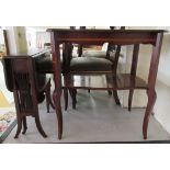 An Edwardian satinwood inlaid mahogany occasional table, the top with a crossbanded, serpentine