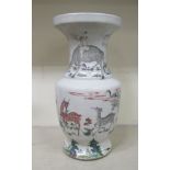 A mid 19thC Chinese porcelain vase of shouldered baluster form with a narrow neck and flared rim,