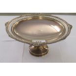 A silver tazza with a uniformly pierced border, elevated on a conical foot  Birmingham 1938  8"dia