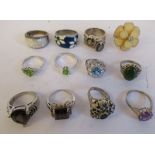 Silver and other white metal rings, each variously set with enamel and/or coloured stones