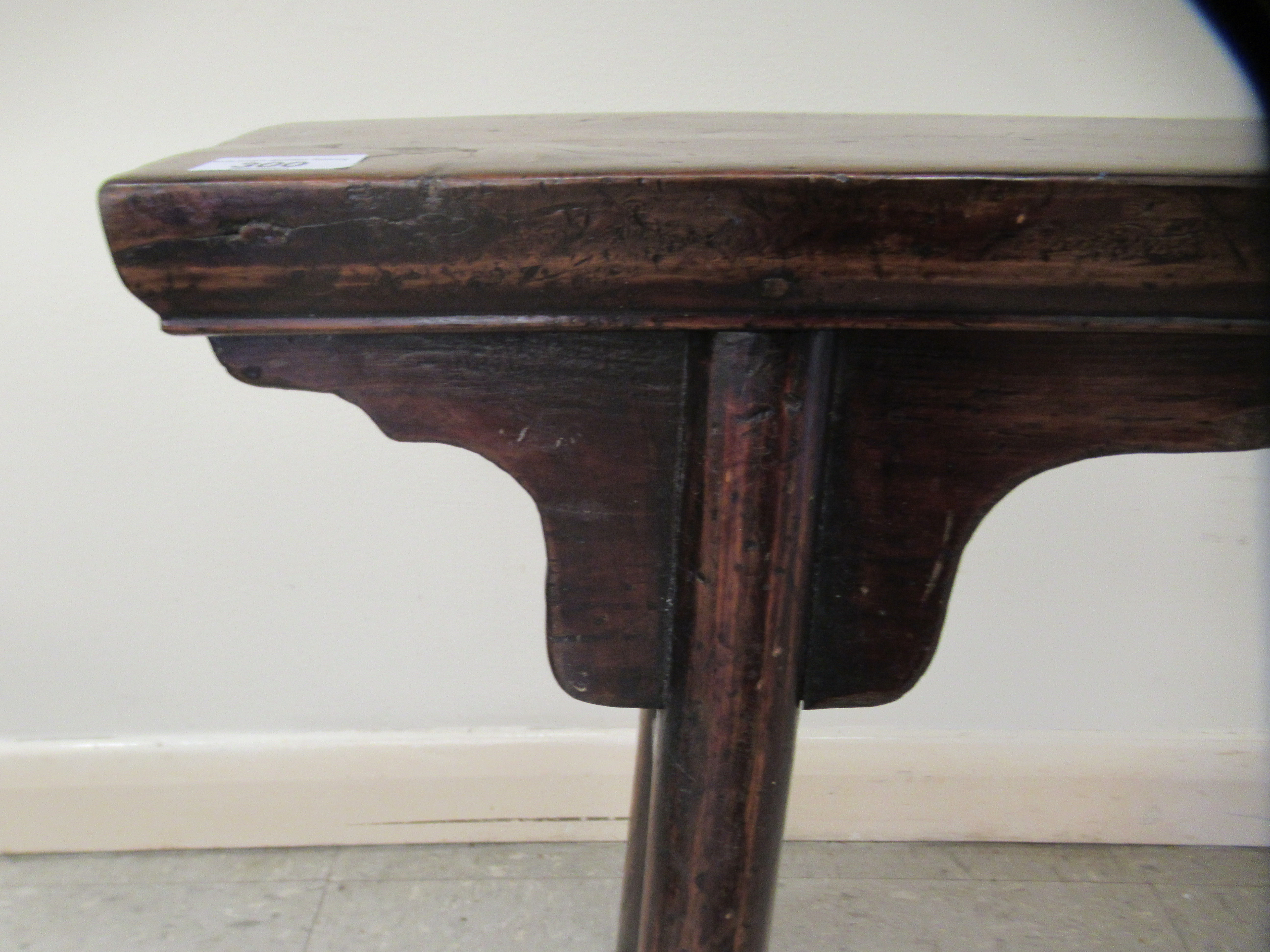 An early 20thC Chinese rustic elm bench, raised on turned, outset legs  21"h  44"w - Image 2 of 5