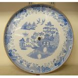 A late 19thC Copeland earthenware Lazy Susan tray, decorated in blue and white with a pagoda in a