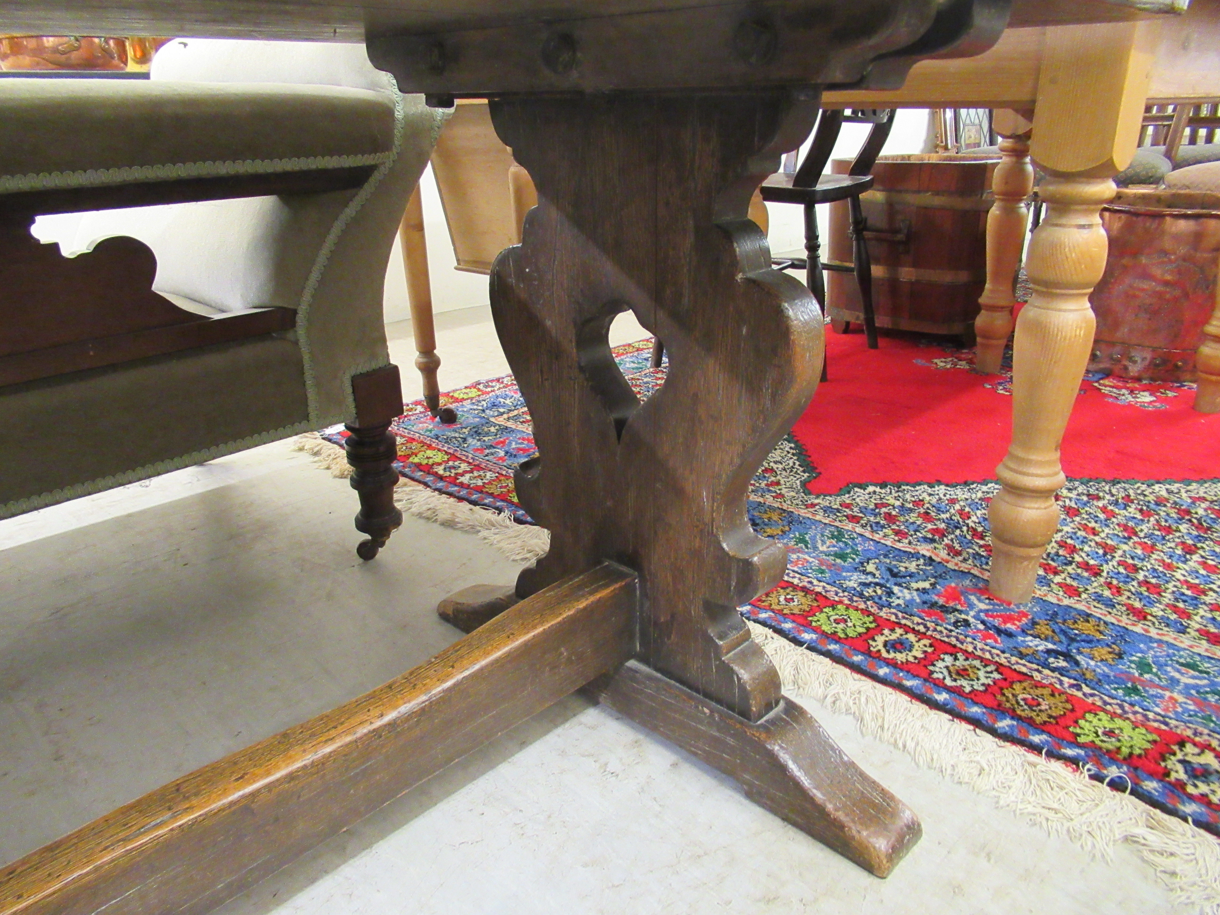 A late 19thC Jacobean design oak refectory table, raised on opposing vase shaped ends and platform - Image 3 of 3