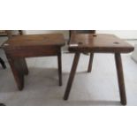 Two late 19th/early 20thC rough cut milking stools, one pine, one elm