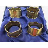 A presentation set of four silver napkin rings  Birmingham 1991  boxed