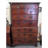 A George III mahogany chest-on-chest with a moulded cornice, over two short/six long graduated