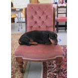A late Victorian walnut framed salon chair with a button upholstered pink fabric back and seat,