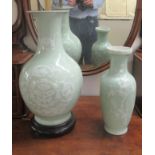 A 20thC Chinese celadon glazed and decorated china bulbous vase design table lamp  18"h; and a