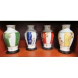 A set of four modern Franklin Mint porcelain vases, decorated in Japanese taste  11"h