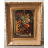 P C Steenhouwer - a still life study, fruit and vegetables, hanging from an arched window  oil on