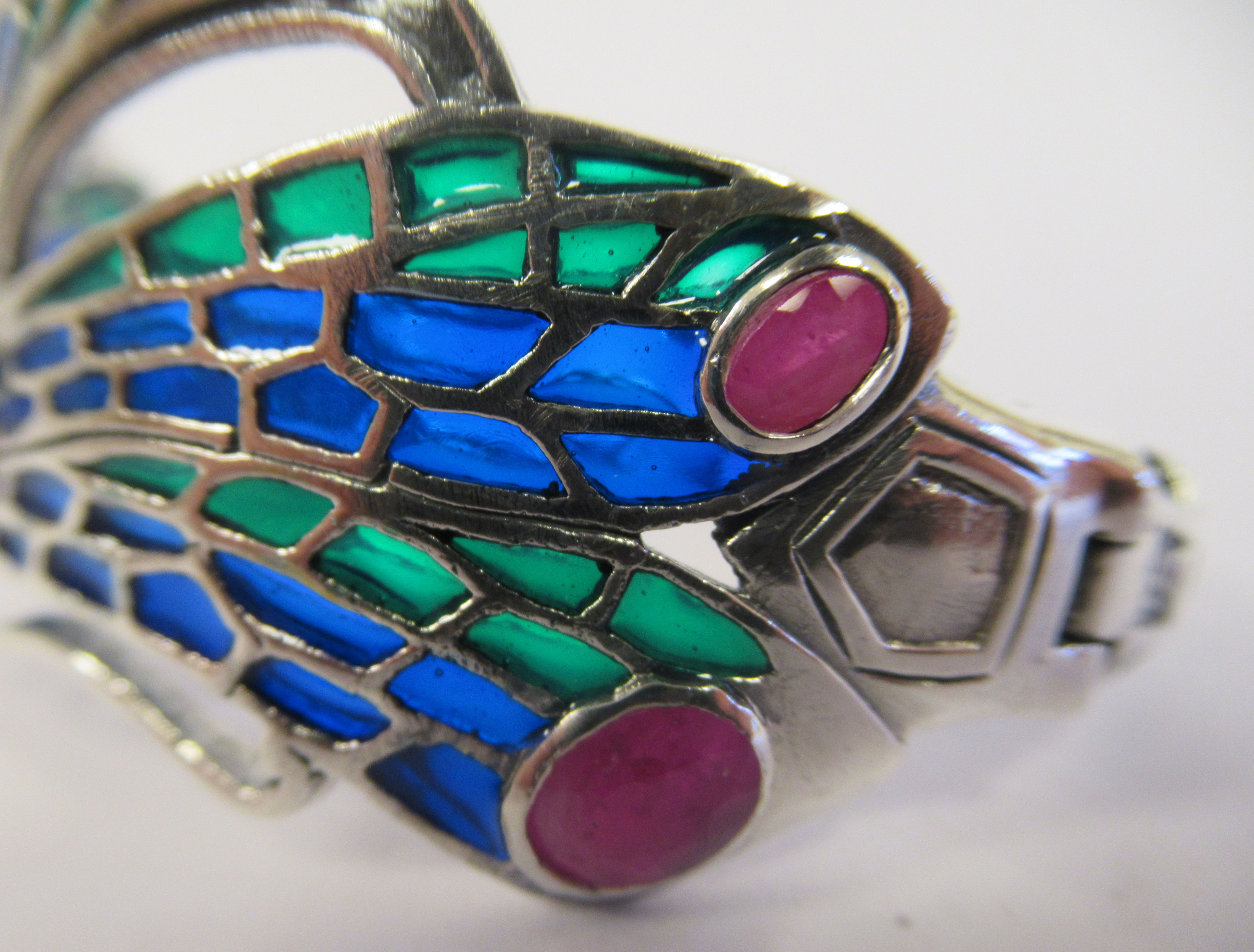 A silver pliqué-a-jour butterfly design, hinged bangle, set with an opal and rubies - Image 5 of 5