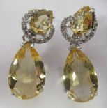 A pair of silver coloured metal citrine and cubic zirconia set pendant earrings