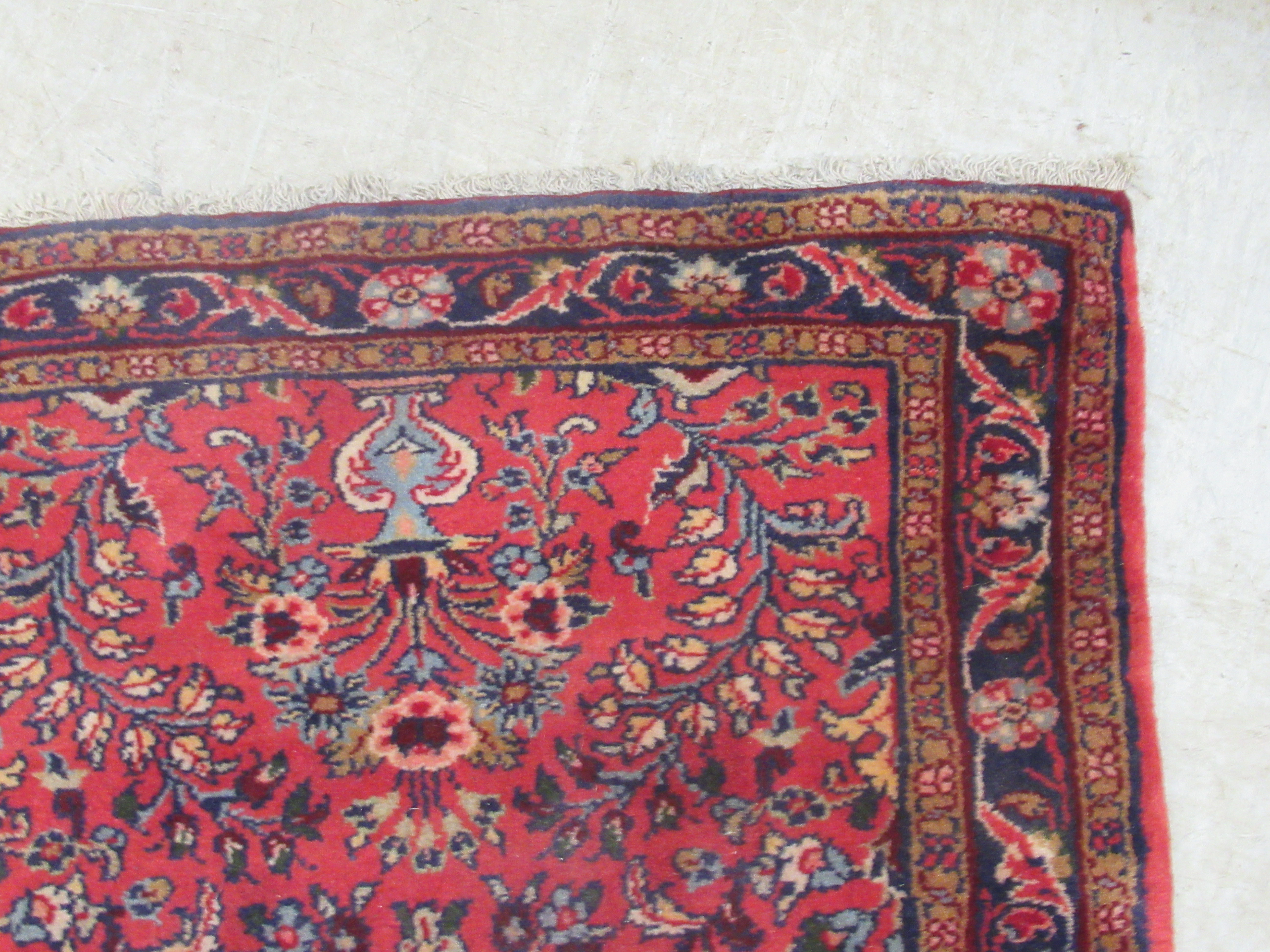 A Persian runner, decorated with floral motifs, on a red ground  106'' x 33'' - Image 4 of 5