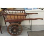 An early 20thC street vendors/florists two spoked 18" wheel wooden handcart  26"w