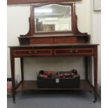 An Edwardian Maple & Co string inlaid ebony and crossbanded mahogany dressing table, surmounted by a