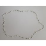 A freshwater pearl necklace, comprising twenty-three beads