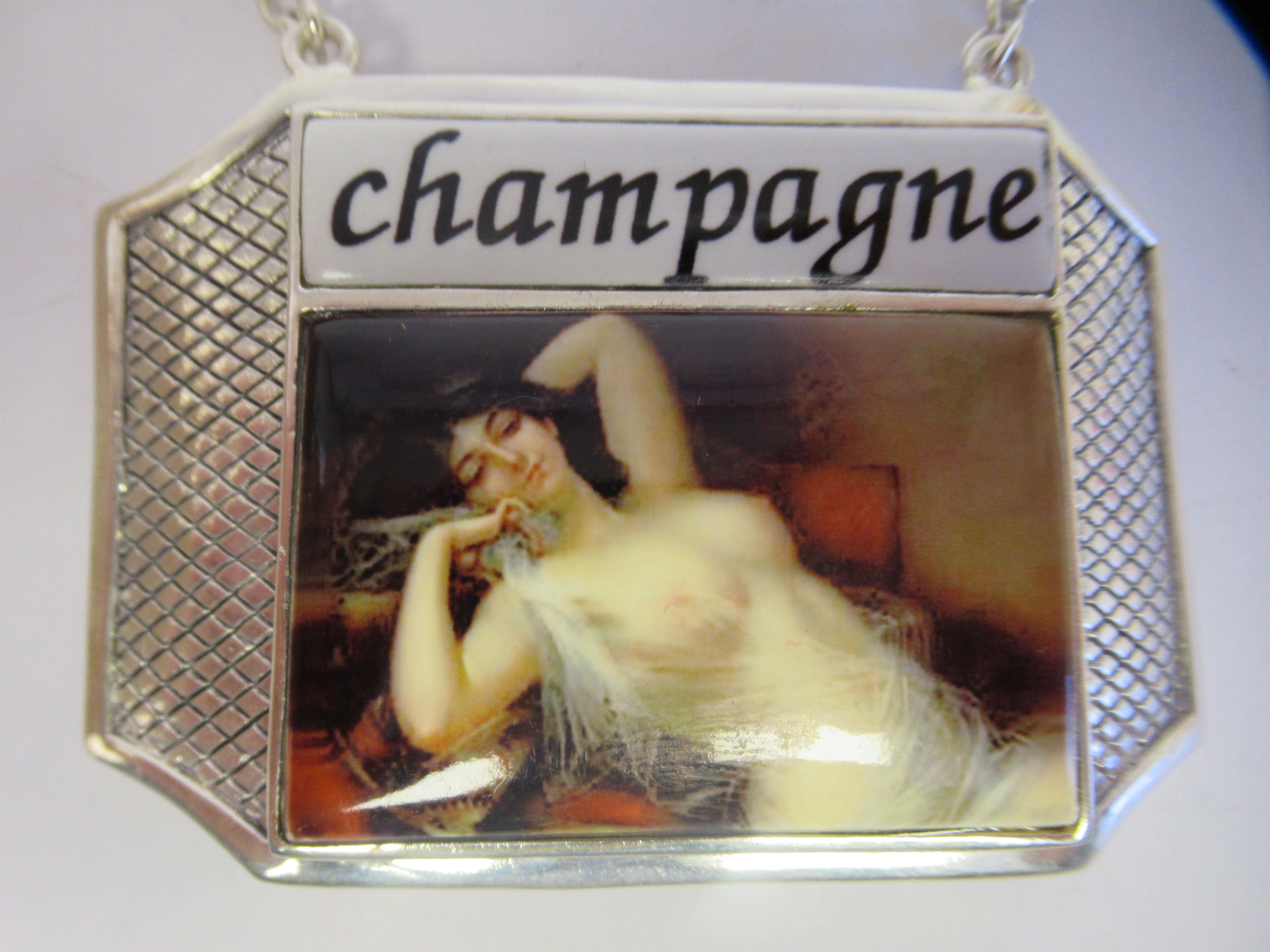 A silver plated and enamelled Champagne label, on a chain - Image 2 of 4