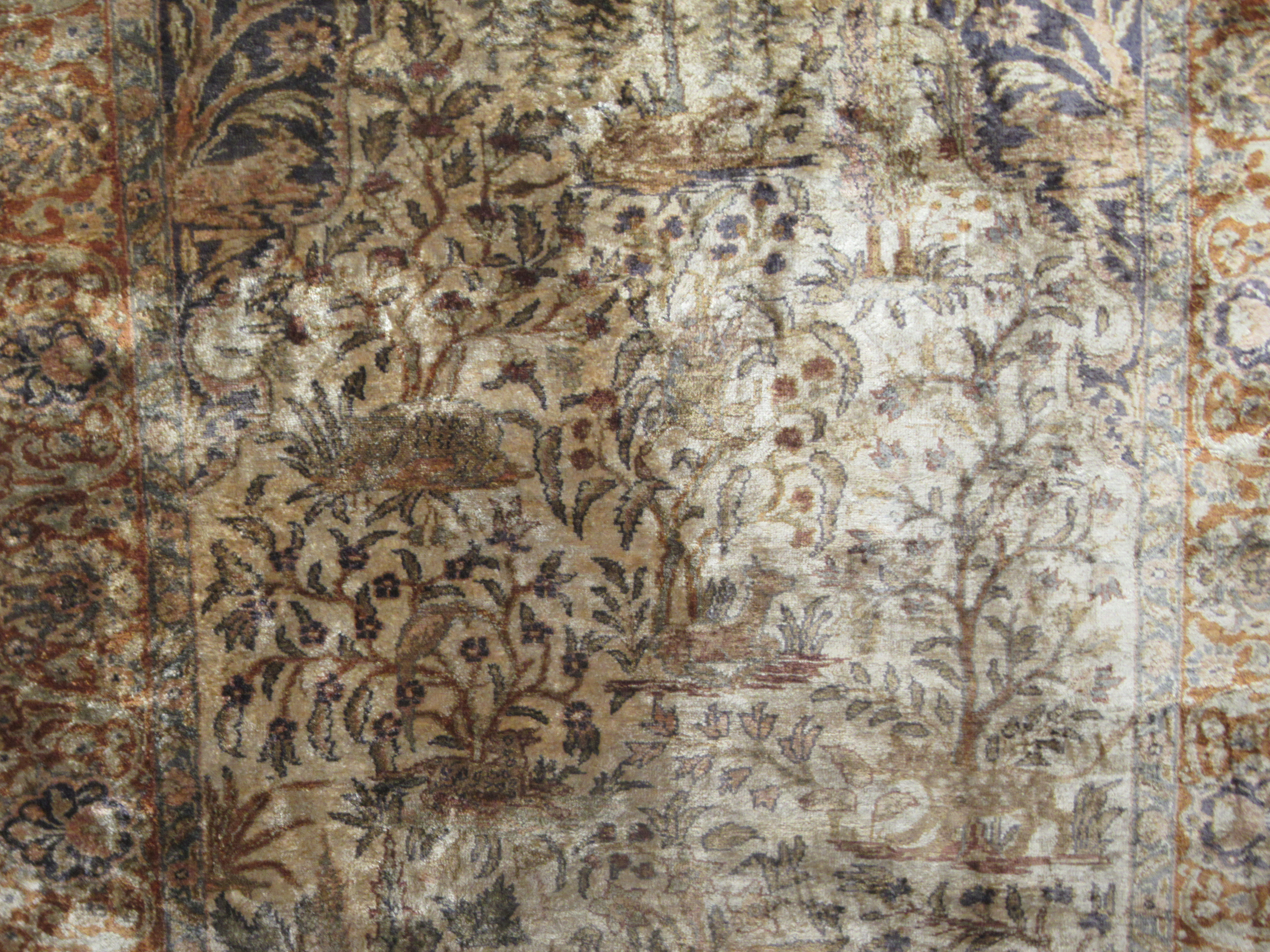 A Persian, partial silk, woven pictorial rug, decorated with animals, trees and other stylised - Image 2 of 4