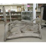 A driftwood garden swing seat  50"w