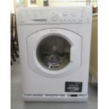 A Hotpoint Aquarius 7kg washing machine  33.5''h  23.5''w