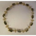 A 10ct gold diamond and tourmaline bracelet