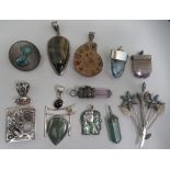 Silver and silver coloured metal jewellery, mostly brooches, set with semi-precious stones