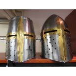 Two modern replicas of Medieval knights' helmets