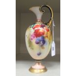 A Royal Worcester blush ivory glazed and gilded china ewer of ovoid form, having a narrow neck,