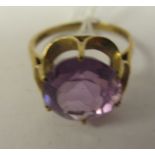 A 9ct gold claw set amethyst ring
