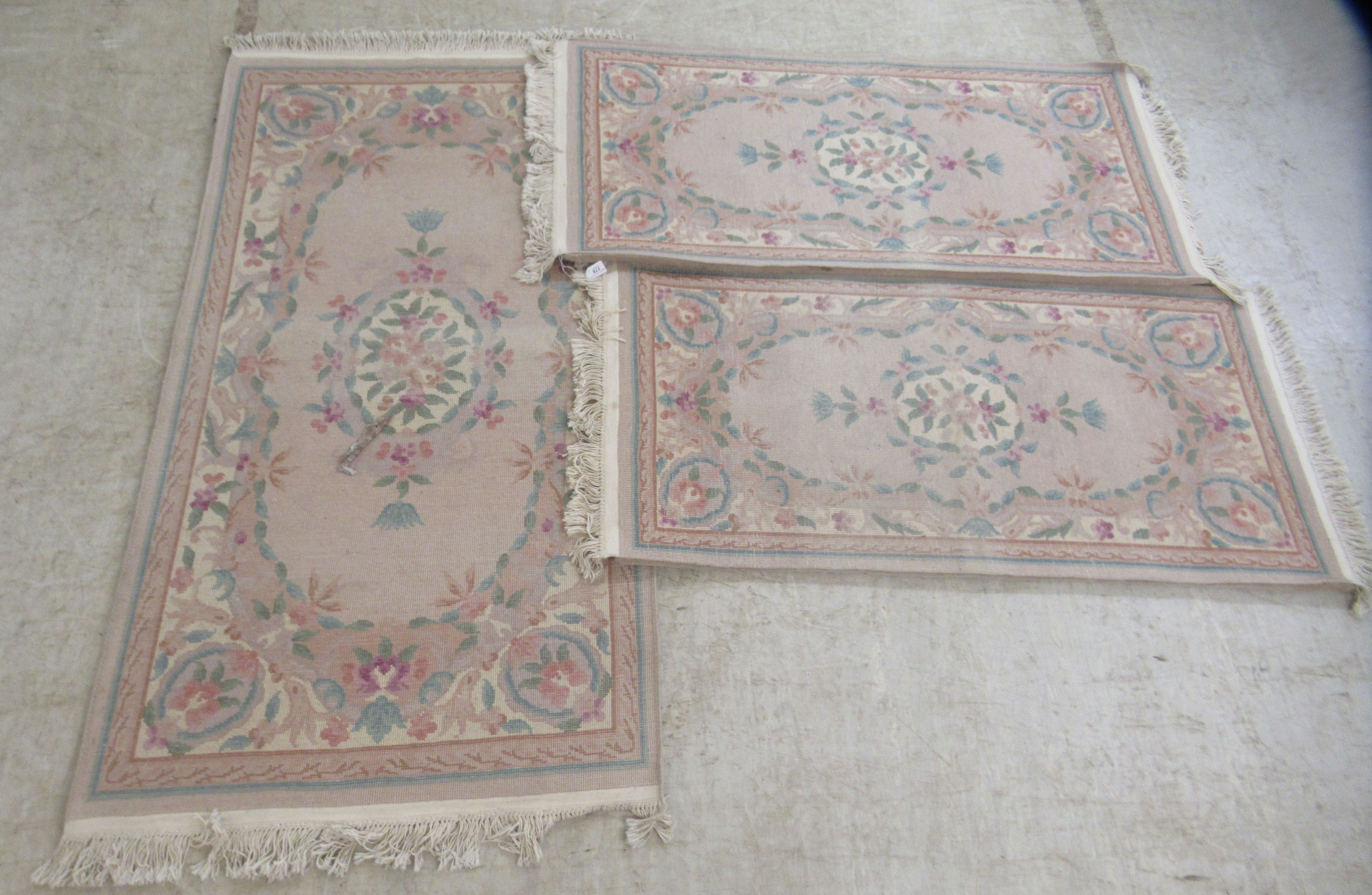 Three identical Chinese cotton rugs, decorated in pastel shades with floral designs  36'' x 60'' and - Image 3 of 3