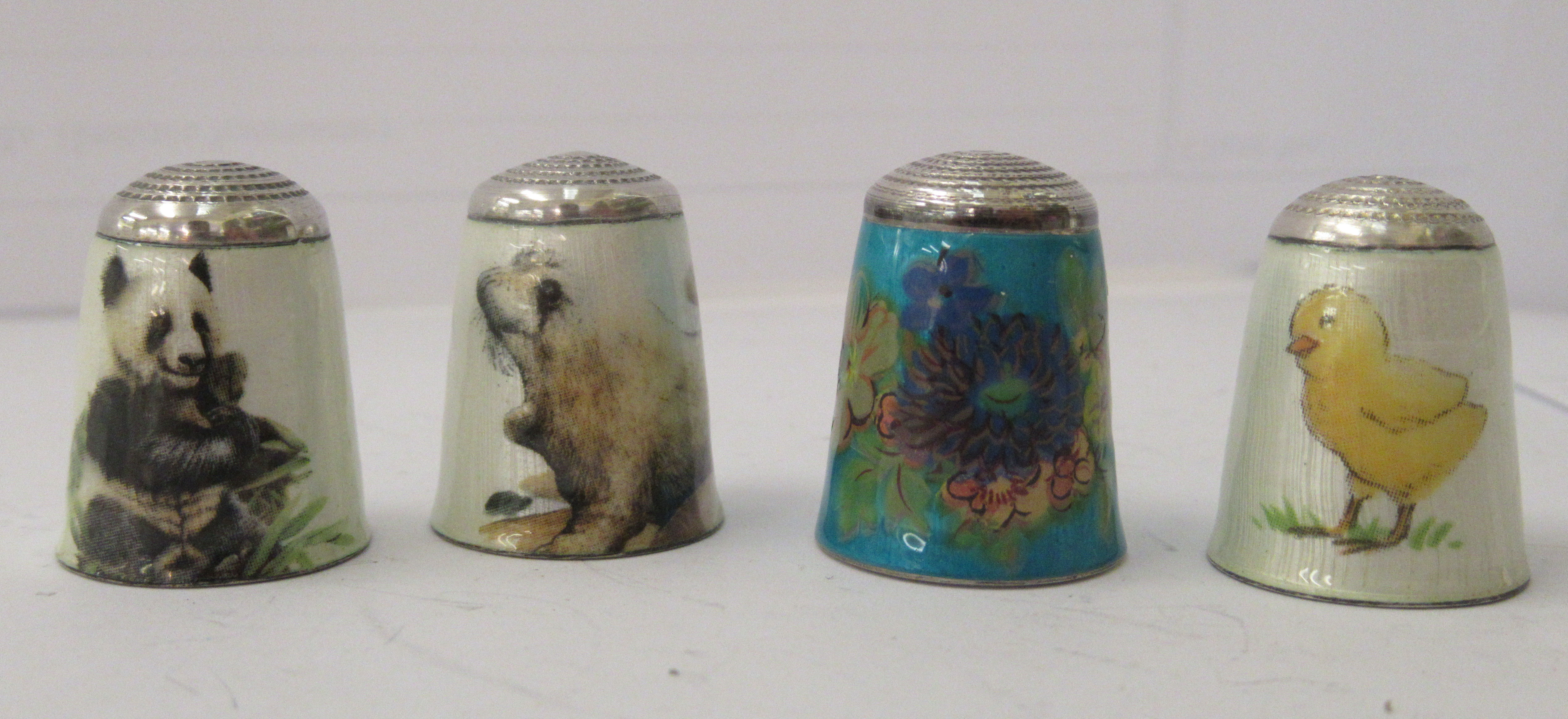 Eleven enamelled white metal thimbles, mostly decorated with wildlife - Image 3 of 3