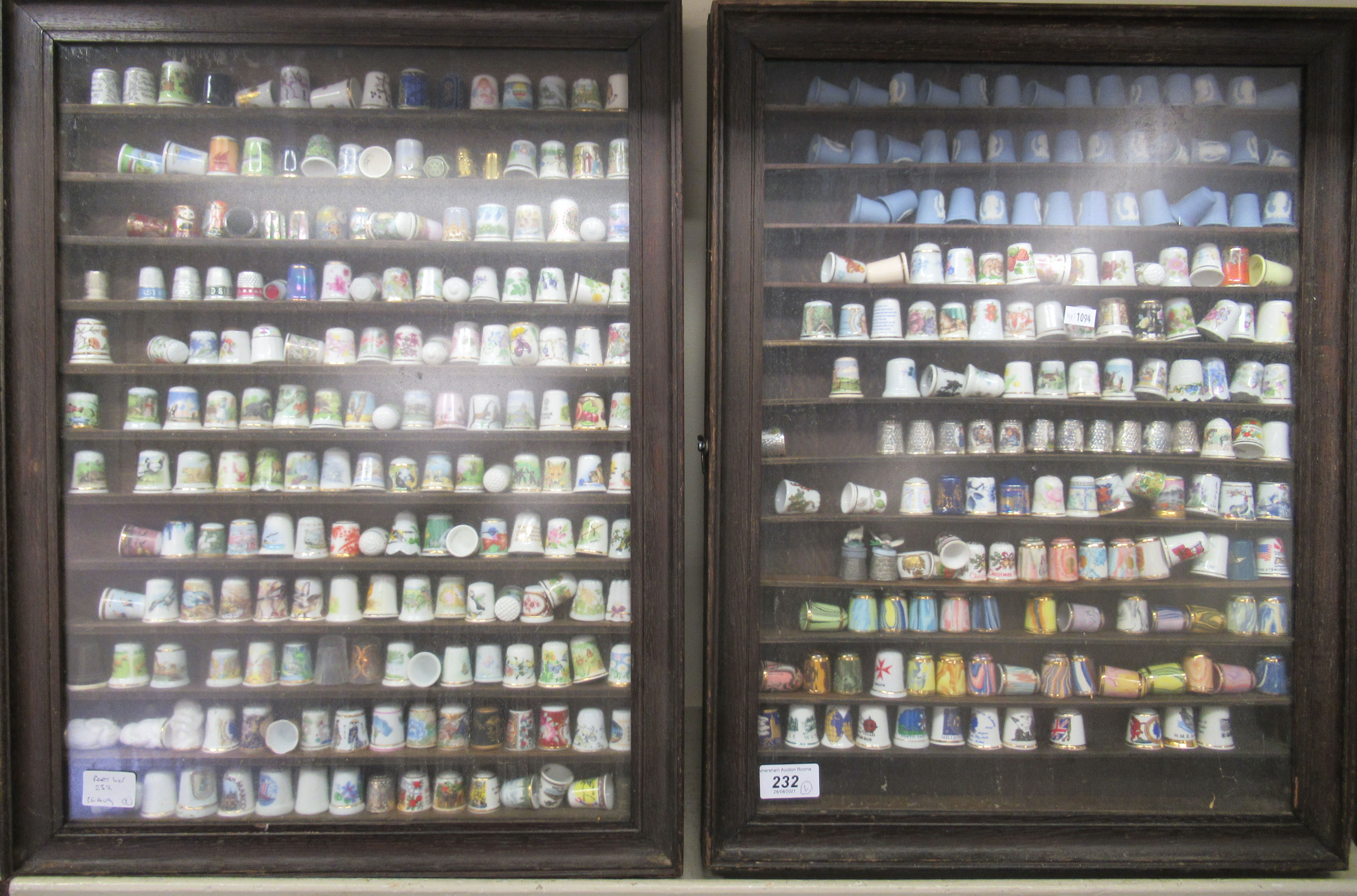 A collection of modern thimbles, mainly ceramic and handpainted  cased