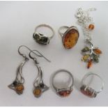 Silver and silver coloured metal jewellery, mostly set with amber coloured beads